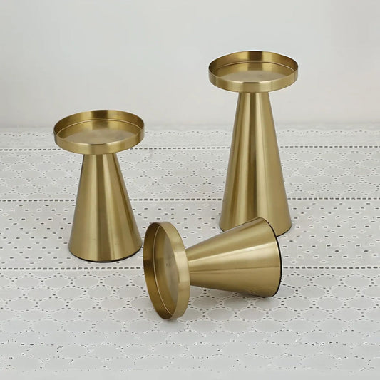 Hikari Brass Candle Holders – Set of Three Sculptural Forms