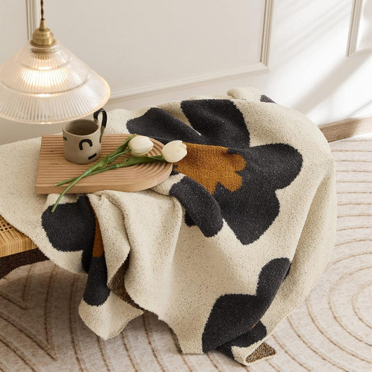 BloomWeave Floral Knitted Blanket – Soft Layers of Calm & Artistic Charm