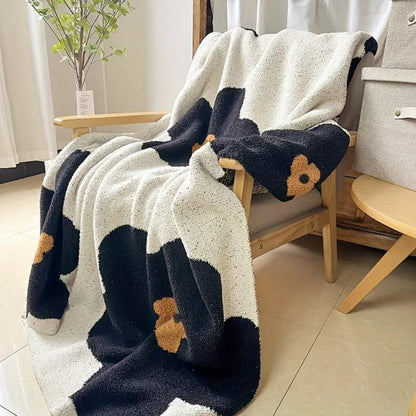 BloomWeave Floral Knitted Blanket – Soft Layers of Calm & Artistic Charm