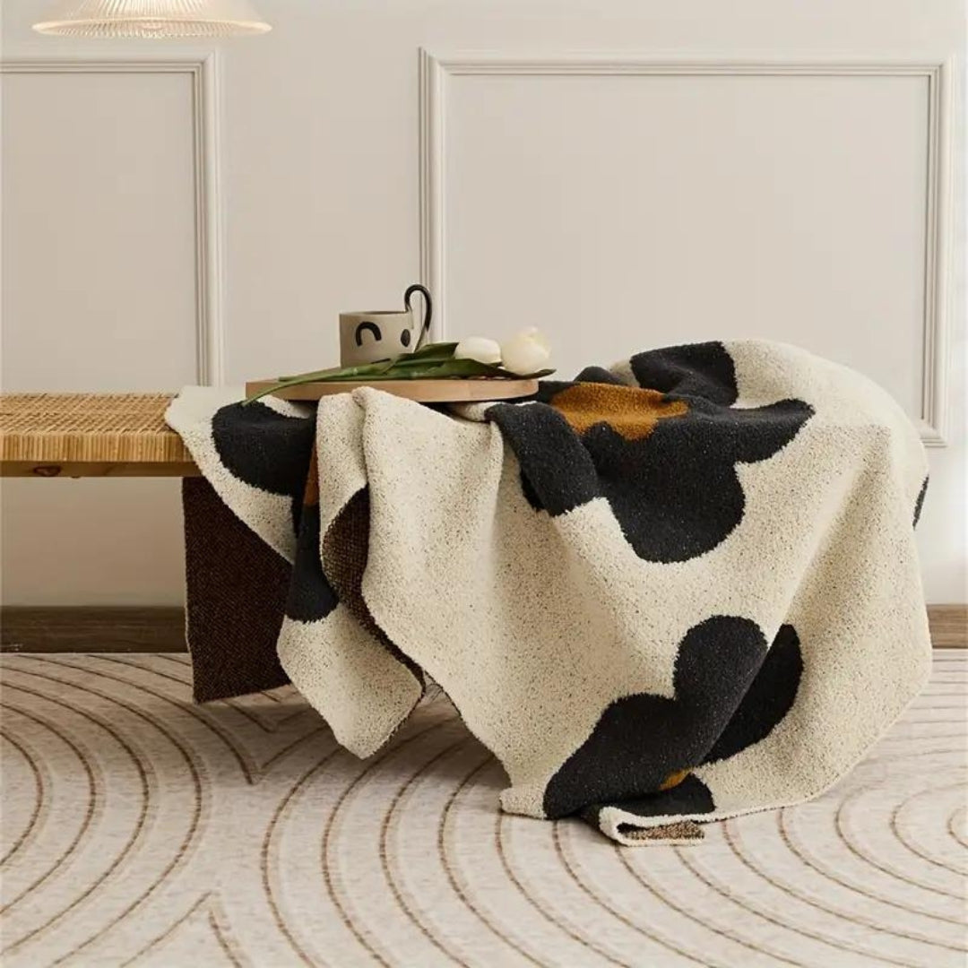 BloomWeave Floral Knitted Blanket – Soft Layers of Calm & Artistic Charm