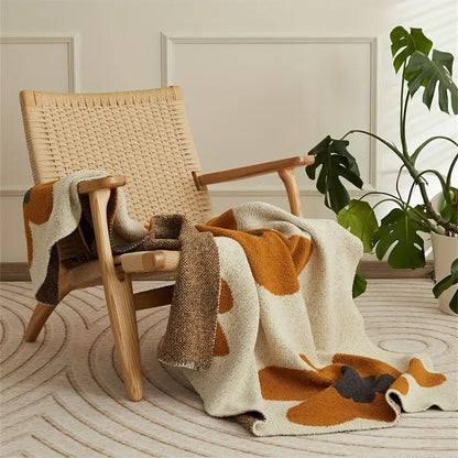 BloomWeave Floral Knitted Blanket – Soft Layers of Calm & Artistic Charm